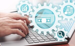 A person's hands typing on a laptop with digital icons of money, a graph, and a magnifying glass overlaid